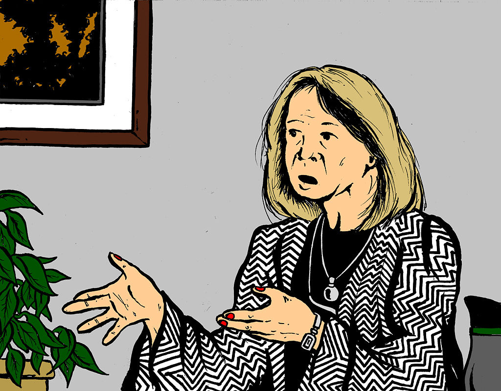 Karen Miller speaks in her office